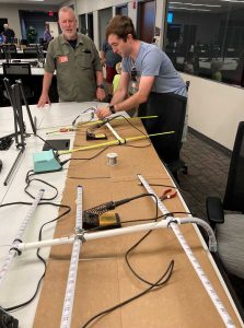 Andrew, N5EI completing the tape measure Yagis [Dave, KI4PSR]