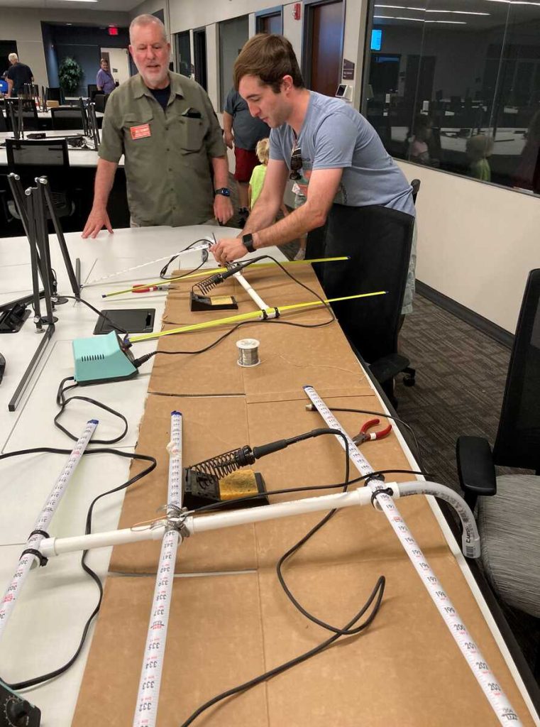 Andrew, N5EI completing the tape measure Yagis [Dave, KI4PSR]