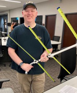 Doug with his completed tape measure Yagi [Dave, KI4PSR]